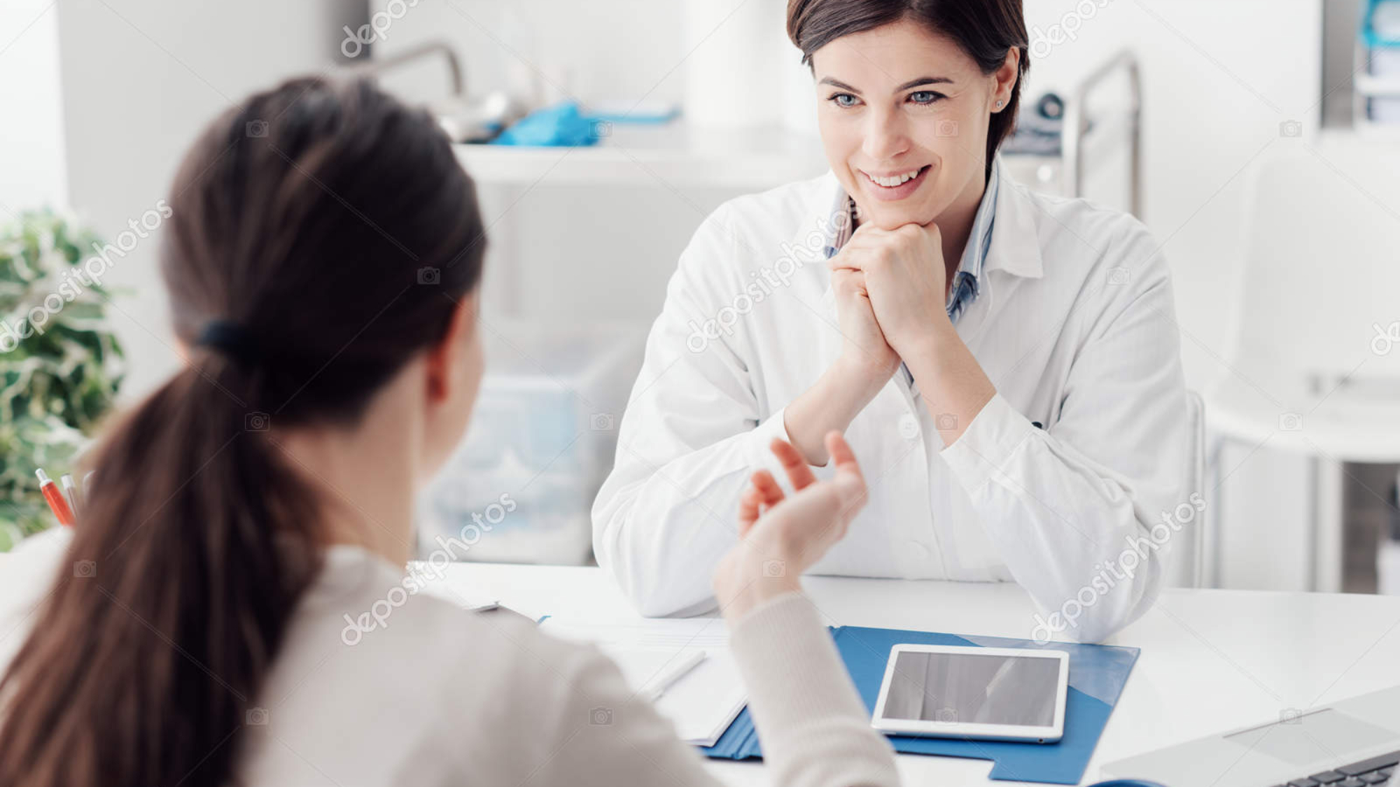 Doctor working in the office and listening to the patient, she is explaining her symptoms, healtcare and assistance concept
