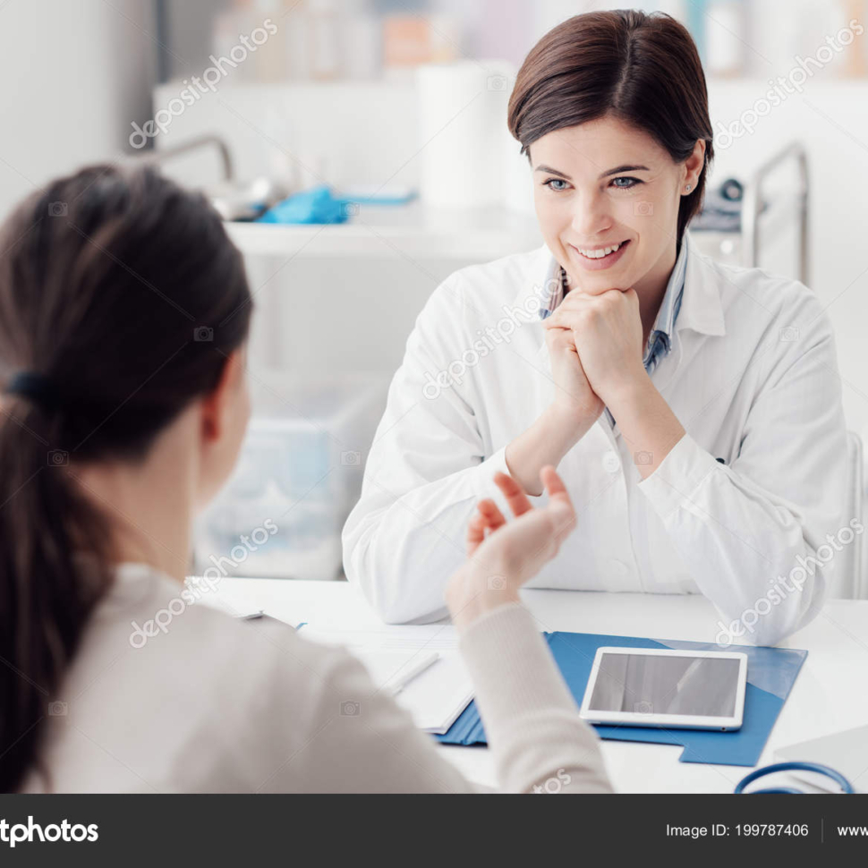 Doctor working in the office and listening to the patient, she is explaining her symptoms, healtcare and assistance concept