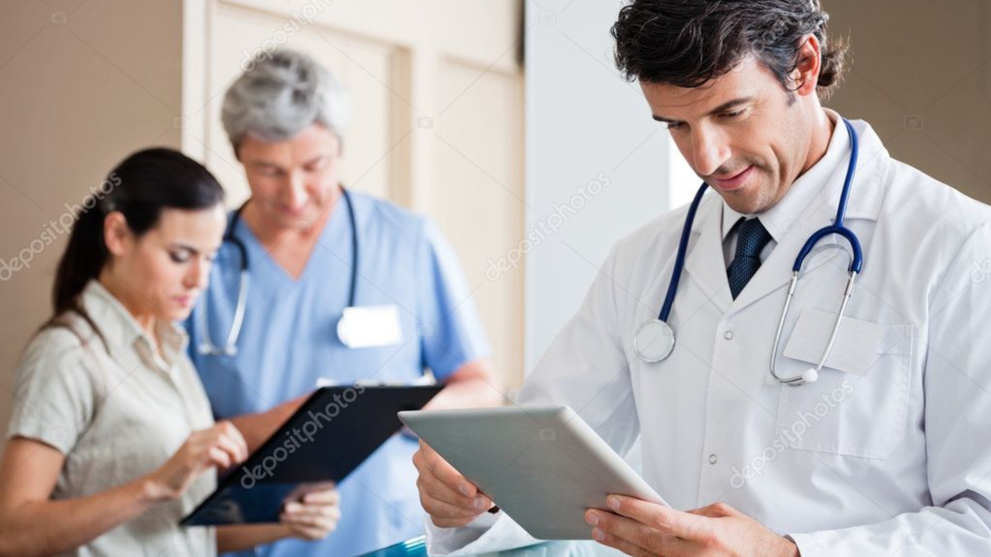 depositphotos_21838199-stock-photo-male-doctor-holding-digital-tablet