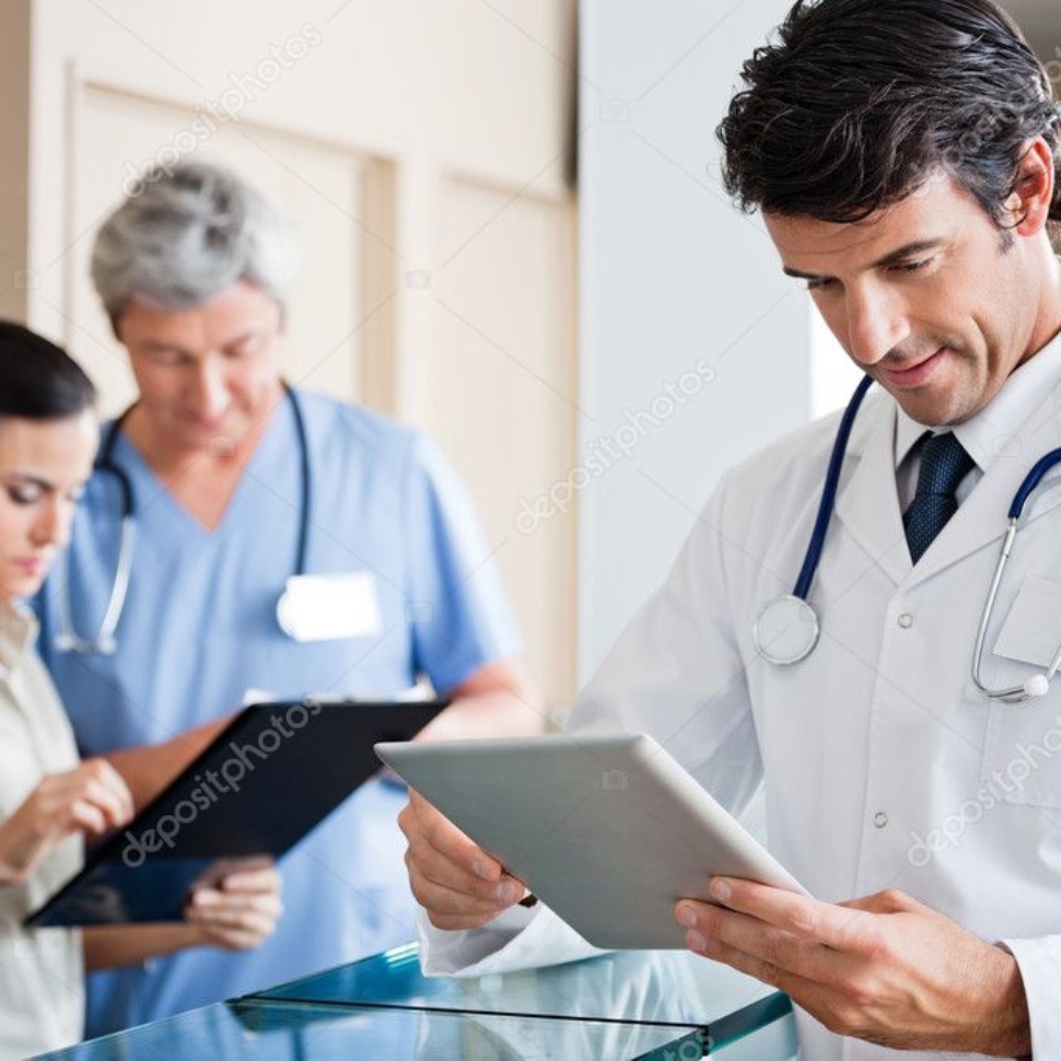 depositphotos_21838199-stock-photo-male-doctor-holding-digital-tablet