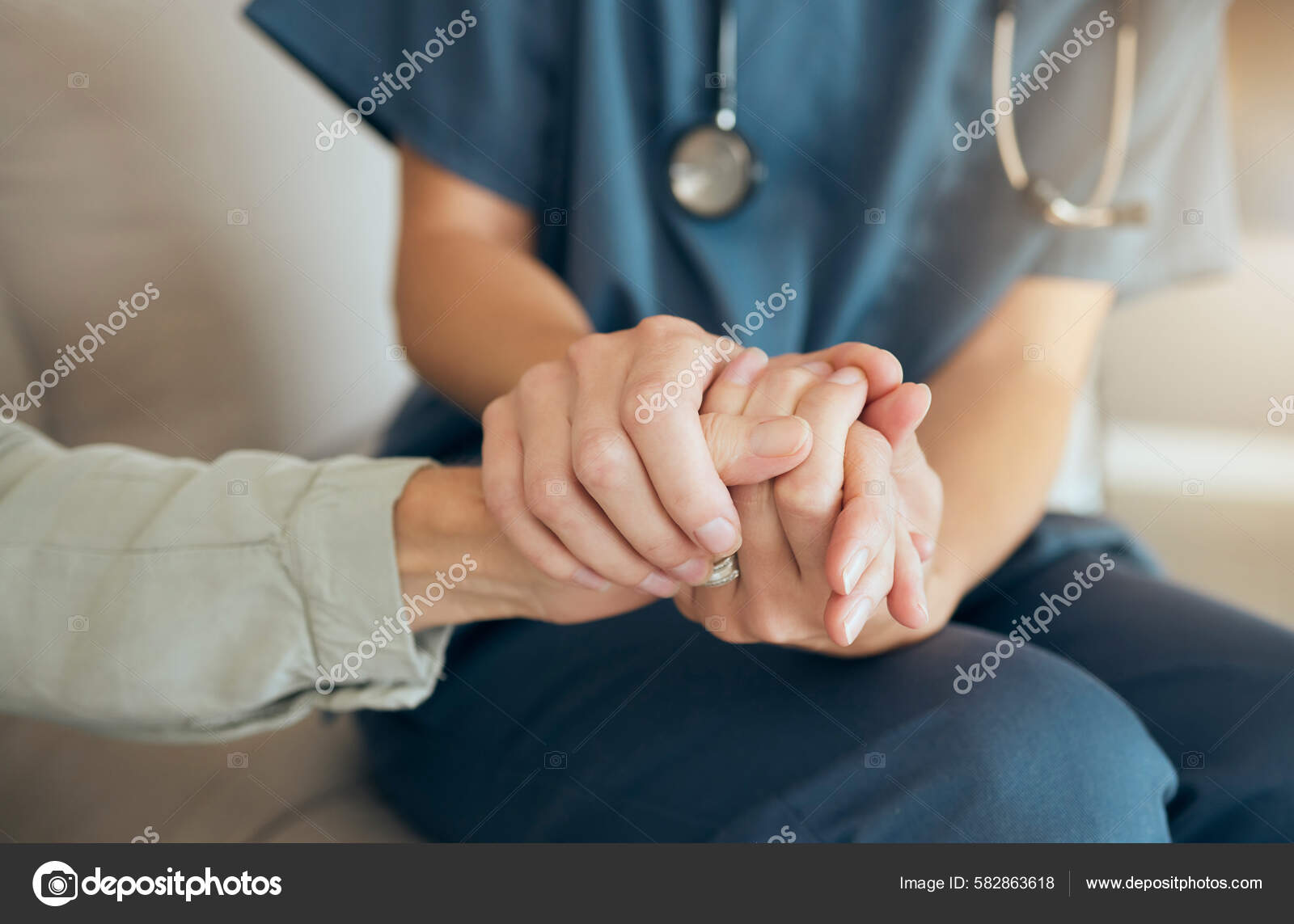 Closeup of an unrecognizable doctor offering their patient support during recovery. A loving unknown doctor holding the hand of her patient and showing kindness while doing a checkup at home.